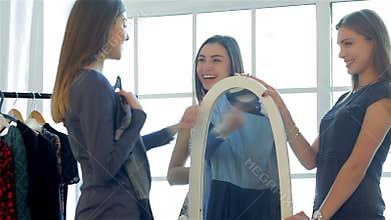 Girlfriend at the mirror looking at his new