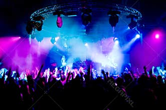 People dancing at the concert