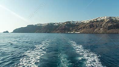 View from the back of the boat leaving an island