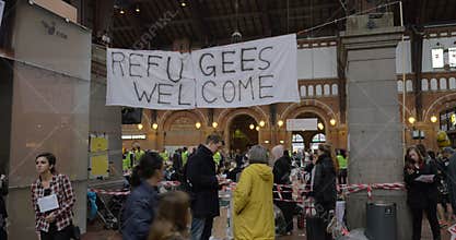 Banner Refugees Welcome Hanged by Charity