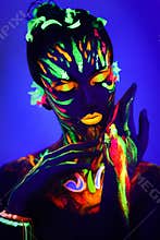 Neon make up art glowing painting