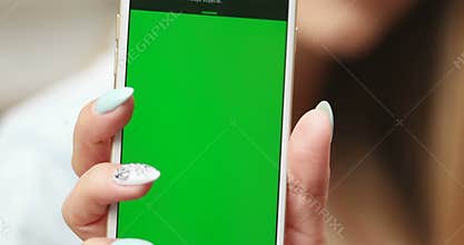 Woman showing mobile screen