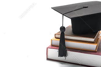Graduation cap and book