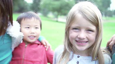 Group Of Young Smiling Young Children Looking Into Camera