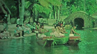 HAWAII 1976: Hawaiian men boat dancers hula in sync in traditional dress.