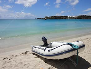 Inflatable zodiac boat on the beach.