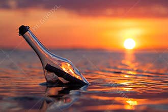 Bottle with a message in the sea