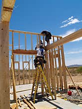 Men Building Frame for House - Vertical