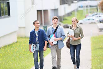 Group of students walking outside campus