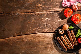 Grilled barbecued sausage with mushrooms