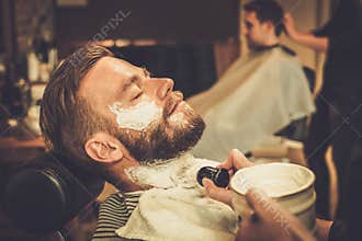 Client during beard shaving