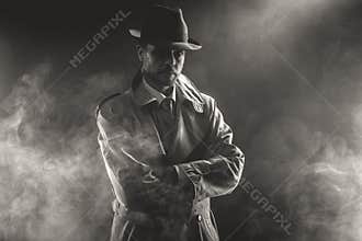 Mysterious man waiting in the fog