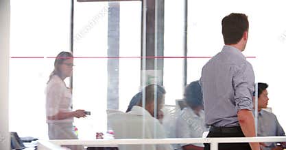 Manager Leaves Office And Joins Staff Meeting In Office