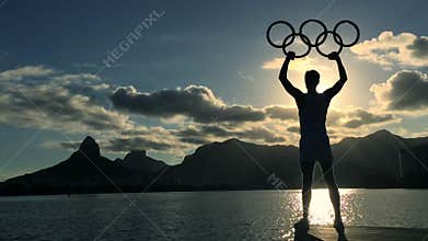 Athlete with Olympic Rings Lagoa Sunset Rio de Janeiro Brazil