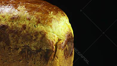 Homemade Bread Rotates on a Black Background