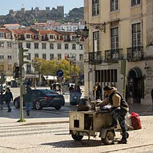 Lisbon, Portugal: hawker of roasted chestnuts