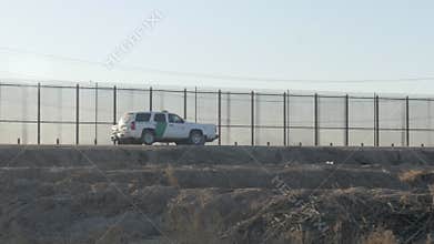 Border Patrol Vehicles Parked Near the US and Mexico Border