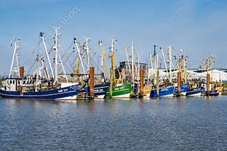 Fishing Boats in a Harbour and a Blue Sky