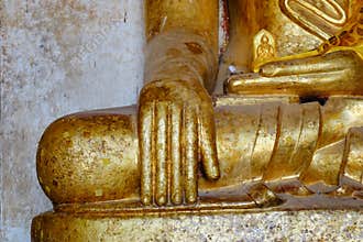 Golden Buddha statue at the Thatbyinnyu Temple in Bagan, Myanmar