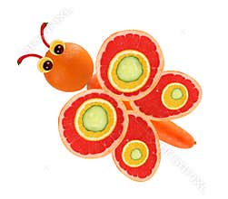 Creative food concept. Funny little butterfly made of fruits and