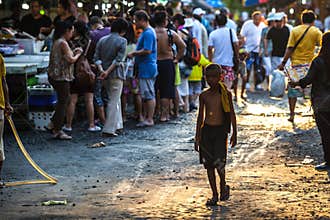 Lonely child at the fish market