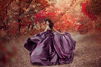 Lady in a luxury lush purple dress