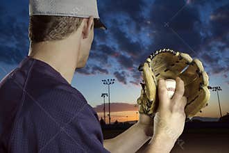 Baseball pitcher ready to pitch in an evening baseball game