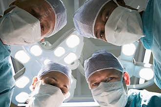 Low Angle View Of Four Surgeons
