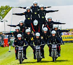 Pyramid Stunt Motorbike Riders
