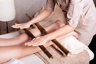 Creole massage with bamboo sticks