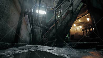 Abandoned industrial interior in dark colors with glowing lights