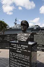 Memorial to Vice Admiral Clifton A. F. Sprague next to the USS Midway in San Diego