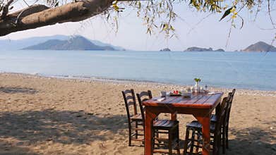 Turkish breakfast at beach by sea, fethiye, turkey