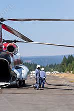 Chinook helicopter and fire crew