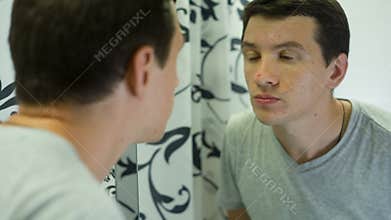 Man dissatisfied with his skin