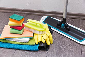 house cleaning equipment and accessories on the floor