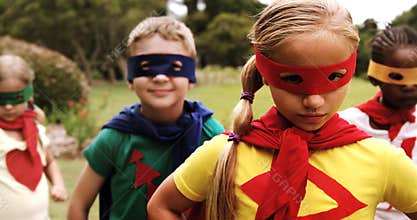 Group of kids pretending to be a super hero