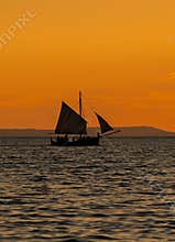Wooden boat at sunset