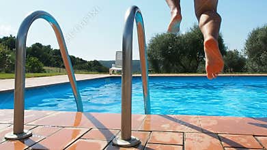 Man diving in swimming pool