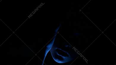 Pretty brunette woman with blue eyes artistic portrait