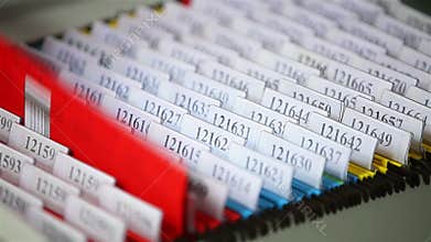 Looking files in desk drawer