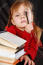 Girl with a pencil and books
