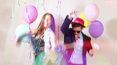 Funny crazy couple having awesome time dancing