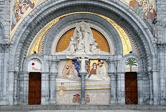 The decorated entrance of the Lourdes Basilica