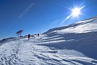 Trekkers following mountain path