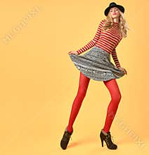 Fall Fashion. Woman in Autumn Outfit. Long Legs
