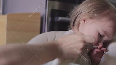 Cute little girl with dirty face doesn`t want to eat