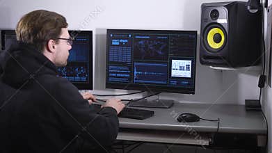 Hacker with glasses on the eyes in black jacket with a hood, failed its mission of breaking the secret data. He is