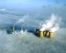 Power station in fog, aerial.
