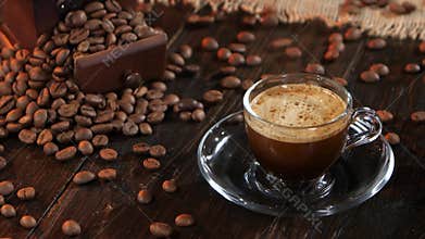 Brew instant black coffee in glass cup on a saucer